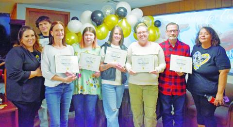 The recent graduates of Hope Builders’ first Journey Hope class celebrate with their instructors at their graduation ceremony on Monday. Photo/Emily Kalka