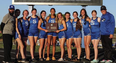The regional champion Stroud Lady Tigers track team: from left, Assistant coach Jayson Cooper, Emily Bixler, Audrey Donaldson, Charley Coleman, Mattie James, Kileigh Mixon, Kenlee Parrick, Peyton Davis, Haylee Durrence, Savanna Collins, Audrey Chace, head coach Kelly Brown. Photo/Mario Holland