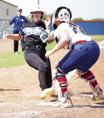 Chandler catcher Rylee Capps tags out a Bethel runner during the Lady Lions’ 12-3 win in district play Thursday. Chandler went on to beat Ada, 16-8 and 14-10, to win the championship. Photo/Brian Blansett