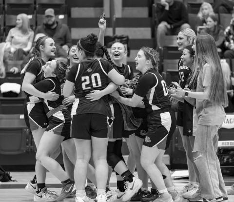 The Meeker girls celebrate after beating Prague, 42-40, last week. Photo/Rick Hester