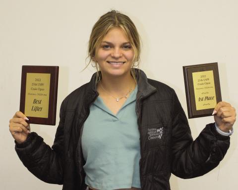 Davenport freshman Jimmie Brownfield established nine new American power lifting records at the Crain Open competition in Shawnee. Added to the 11 she set previously, she now has a total of 20 American records. She was also awarded the Best Lifter Award. She competed in the 125-pound class and has now set records in for different weight classes. Her best lifts at the Crain meet were 182 pounds in the squat, 90 pounds in the bench and 237 pounds in the deadlift. Photo/Brian Blansett