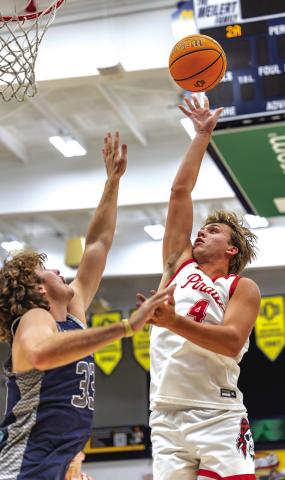 Jett Higdon goes for the high release to get two points. Photo/Rick Hester