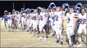 Chandler’s Lions celebrate after beating Luther 20-0 last week and earning a home-field game for the first round of the playoffs. Photo/Brian Blansett