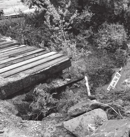 A bridge that absorbed flood damage on East 1060 Road in Lincoln County. Photo/Brian Blansett