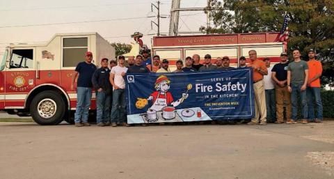 Pictured above, Kent Clovis stands with the Stroud Fire Department. Photo/submitted.