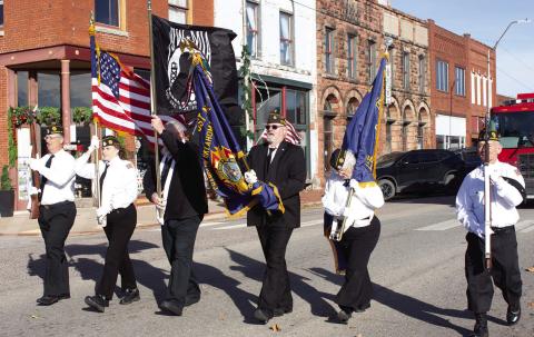 The color guard led the Veterans Day parade through downtown Chandler Tuesday morning. We have our annual Salute to Veterans on Pages 1-8 in this week’s edition. Photo/Brian Blansett