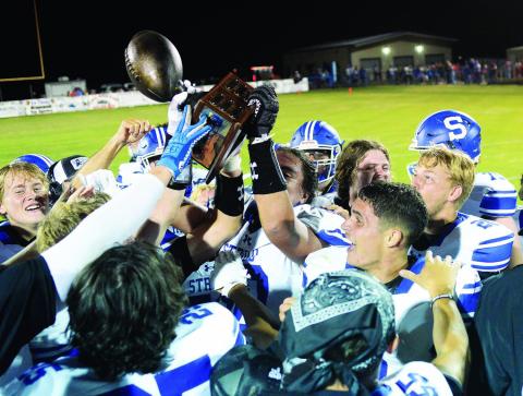Stroud won the 66 Classic trophy Friday night, beating Chandler 21-14 and breaking a four-year Lions’ winning streak. It was the first time for Stroud’s seniors to win the trophy and they made of it in the post-game celebration. For more on the game, please see Page 1C. Photo/Brian Blansett