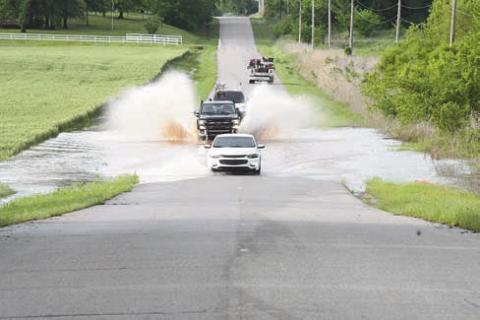 Two deaths reported, dozens of roads closed