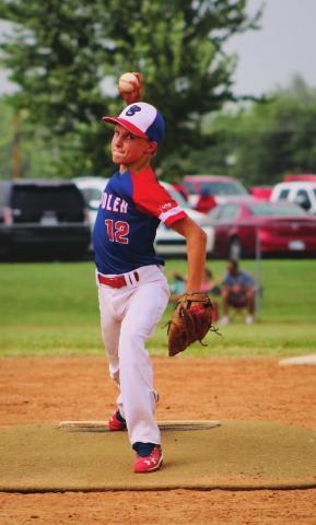 Pictured above, Cale Mitchell pitches the ball to home plate.