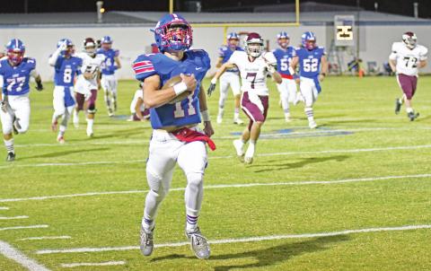 Lions romp, 48-7