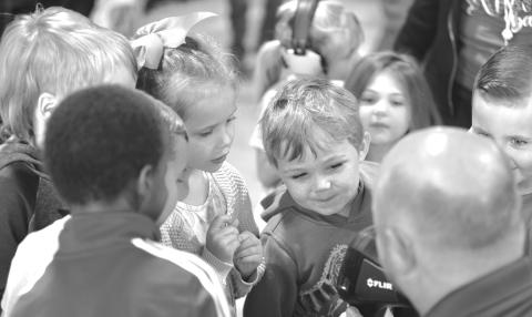 A group of Pre-K students from Parkview Elementary School in Stroud listen as a Stroud firefighter explains how some of their equipment works. The students visited the fire station on Oct. 10. Photo/Baylee Billings
