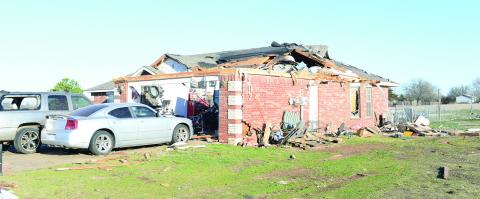 This house located on Rachel Drive south of Moccasin Trail and west of Bryan Street in northeastern Pottawatomie County was heavily damaged Sunday night as severe storms moved through the area, including hurricane-force winds and a tornado. This home was one of 46 in the area that was heavily damaged or destroyed District 1 Commissioner Melissa Dennis said. Photo/Brian Blansett.