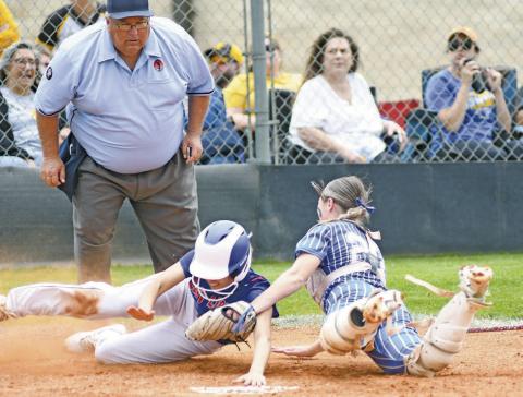Chandler’s Brenlee Corea slides home safely against Bethel as umpire Keith Little looks on during regional tournament play Monday. High school spring sports are in full heading to the post season. The slow-pitch state tournaments will be Tuesday and Wednesday at Firelake; the regional track meets will be this weekend, with Stroud hosting a 3A/2A regional; baseball regionals May 1-3; and golf state tournaments the first two weeks of May. Photo/Brian Blansett