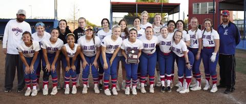 Chandler’s Lady Lions pose with the district championship trophy last week after dispatching Bethel and Ada. Stroud, Dale, Davenport, Prague and North Rock Creek also moved through district play and will be in regionals this week, which are scheduled for Thursday. Prague, Dale and North Rock will play at home while Chandler will go to Tecumseh, Davenport to Canute and Stroud to Warner. For more on the playoffs for softball, track and baseball, please see Section C. Photo/Brian Blansett
