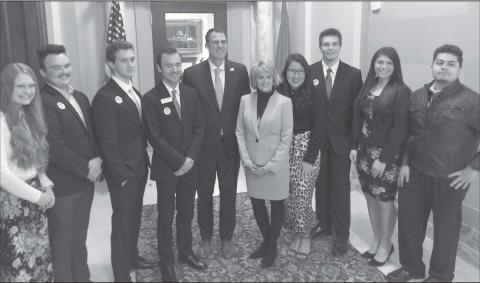 Rose State College students, from left, Aubrey Pruitt and Issac Watham of Meeker and Tanner Hurst of Dale recently visited the State Capitol to participate in Higher Education Day with Rose State College and met with Gov. Kevin Stitt, center. Photo provided
