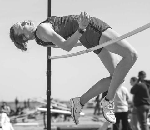 Stroud sophomore Sophie Young clears the bar at 5 feet to win the Hennessey meet. Photo/Mario Holland