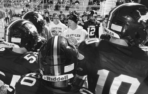 Chandler defensive coordinator Fred Peery talks to the unit during a first-half timeout during the Lions’ 39-12 win over Sperry Friday night. Photo/Brian Blansett