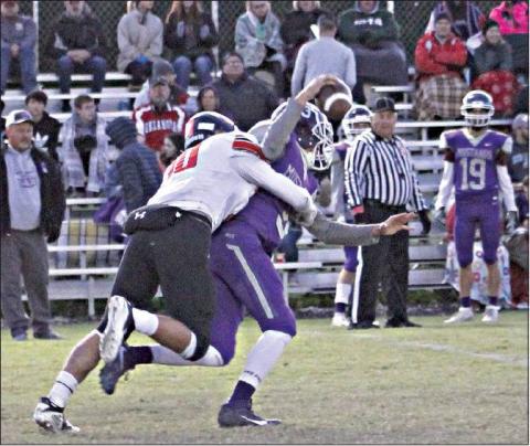 Kyle Hobill brings down a Wesleyan Christian ballcarrier. Photo/Kim Hobill