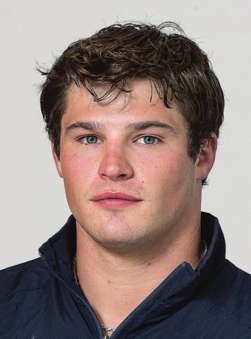 Chandler graduate Heath Gray above, and on the award standard after winning the national championship. Photos/provided