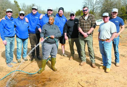A team of volunteers from Lorman Well and Xylem Watermark worked to install a well for a family in Wellston so they could access clean and reliable water on Feb. 15. Photo/Xylem Watermark