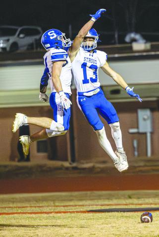 Jacob Beck (4) andAiden Collins (13) celebrate after a touchdown. Photo/Beth Young