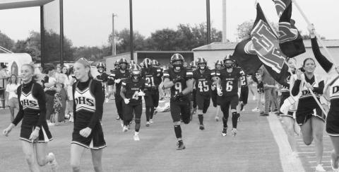 Davenport’s Bulldogs run on to the field before running over Wetumka Friday night. Photo/ Maggie Walker