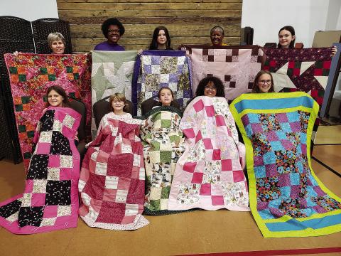 Frm left, front row – Annabelle McCarley, 10, Home School; Rosie McCarley, 7, Home School; Elizabeth Taylor, 7, Edmond; Olivia Taylor, 8, Edmond; Piper Johnston, 13, Camden, Arkansas. back row – Renae Taylor, Adult, Panola; Lena Walker, Adult, OKC; Felicia Woods, 12, Prague; Lynette Harris, Adult, Meeker; and Abby Perry, 14, Meeker.