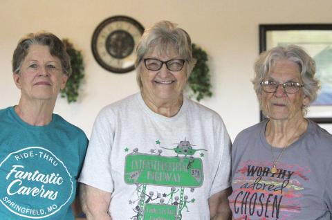 Pictured from left to right, Liz Simmons, Opal Hoover and Barbera Wyes are standing next to each other in the Senior Citizens Center. Before the photo they were preparing for a meal and working on the re-opening of the lobby for the Center. Photo/Lily Huff