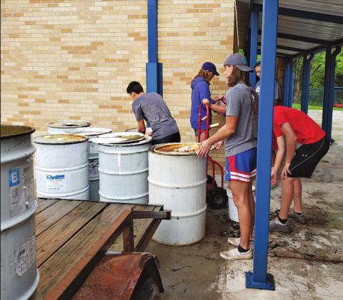 Lions help with playground material