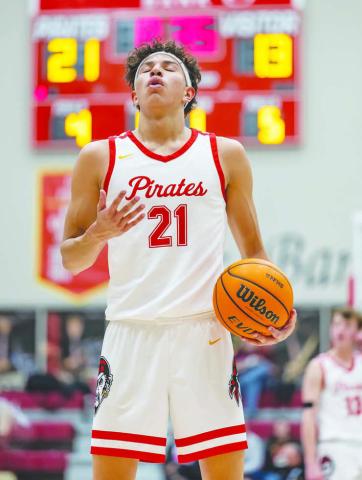 Dale’s Keldan Meely closes his eyes and takes a deep breath before shooting a free throw during the Boomarang Classic at Dale. Photo/Rick Hester