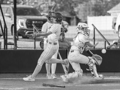 Davenport’s Gabby Murfin scoots by the Ripley catcher for a score during the Lady Bulldogs’ 5-4 victory on Tuesday. Photo/Rick Hester