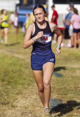 Jordyn Neeley from Stroud en route to a 5:55.566 time and fourth-place finish at the Stroud Invitational cross country meet Saturday. She was the top area finisher at the meet. Photo/Beth Young