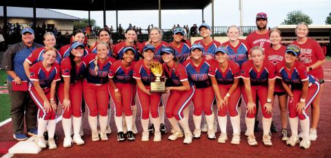 The Chandler Lady Lions pose with the 66 Conference tournament championship trophy Saturday after beating Stroud, 2-1, in the championship game. Photo/Brian Blansett