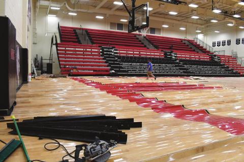The floor in North Rock Creek’s gym shows its warp and wave following a water leak caused by February cold weather. Photo/Brian Blansett