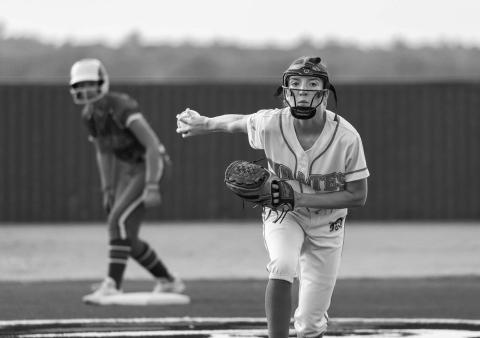 Above, Dale Relief pitcher Adalyn Quigley finishes out the last inning of the game against Chandler. Photo/Rick Hester. Left, sophomore Payton Arms picks up yardage for Chandler against Clinton. Photo/ Brian Blansett. Below, Davenport’s Jaxson Brinkley picks up a good gain before pulled out of bounds against Hillsdale-Kremlin. Photo/Rick Hester. North Rock Creek’s Jayden Clifton keeps her eye on the pitcher in North Rock Creek’s game against Berryhill. Photo/Sheryl Gowin