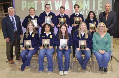 Recipients of the Gordon Richards, Sr., Achievement Award from left to right seated are Katelyn Fleming, Tecumseh, Paige Smith, McLoud, Cora Bender, Dale, Allie Brown, Asher and Jamie Barrick of The Clinic Pharmacy. Standing from left to right are Gordon Richards, Jr., son of the founder of the award, Macy Nelson, Shawnee, Cooper Kline, North Rock Creek, Nate Stephenson, Bethel, Kade Miller, Macomb, Chisam Schiller, Wanette and Tim Barrick of the The Clinic Pharmacy.