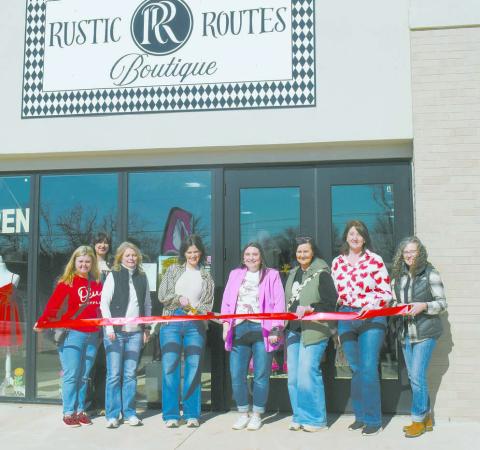 Members of the Chandler Area Chamber of Commerce attend a ribbon cutting at Rustic Routes Boutique on Friday, Jan. 31. The boutique carries clothing for men, women and children, and is located on Rt. 66 in the same complex as Best Physicians Clinic on the east side of Chandler. Photo/Emily Kalka