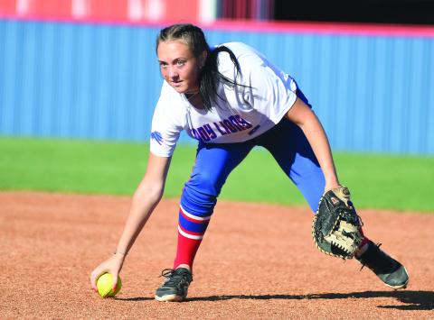 Chandler first baseman Charlee Hicks barehands a ball while keeping an eye on the batter heading to first during the Lady Lions’ game with Lincoln Christian Monday. Photo/Brian Blansett