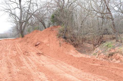 Work along the right of way between Highway 18 and Bell Cow Creek. Photo/Brian Blansett