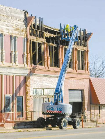 Midwestern Wrecking continues into the third week of demolition on the St. Cloud buildings, now moving to bring down the facade on 1216 Manvel. Because of the complexity of the project, it could take longer to bring both buildings down safely and to preserve the other businesses next to them. Photo/Jennifer Pryor