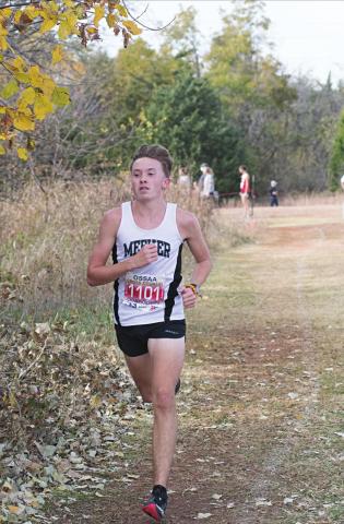 Meeker sophomore Riley Randall had almost a 30-second lead for the second half of the Class 3A state championship cross country meet Wednesday. Above, he runs by himself during the back stretch. Photo/Brian Blansett