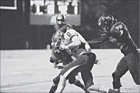 Stroud quarterback Grant Elerick (6) pounds for extra yardage against Konawa. Photo/Tommie Marshall