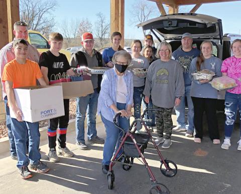 Members of the Deer Creek Baptist Church youth group delivering lunch to Prairie Pointe on Monday.