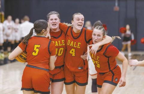 Dale’s Ava Bell (4) leads a spontaneous postgame celebration with Kynlee Bullard (5), Danika Pendley (40), and Teague Muncy (25) after the Lady Lions secured a berth in the state tournament by winning their area tournament. Photo/Rick Hester
