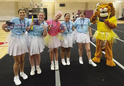 Five Chandler High School cheerleaders and the mascot brought home All-American honors from the Universal Cheer Association national competition last week in Norman. From left are Mia Phipps, Makayela Dawkins, Emi McGuire, Macie Davis, Royanna Berry and Leo the Lion, aka Ashlee Beatty. Leo won spirit sticks, was named the outstanding mascot for the camp and won best routine and the Unicorn award. For more, see Page 5A.