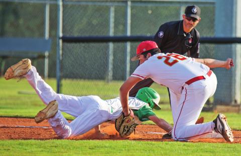 Dale first baseman JB Leaver gets the runner out with a pickoff throw from pitcher Connor Kuykendall during Dale’s win over Rattan in the baseball state tournament. Photo/Rick Hester