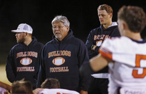 Davenport coach John Greenfield talks to the team after the game against Wilson Friday night. Photo/Rick Hester