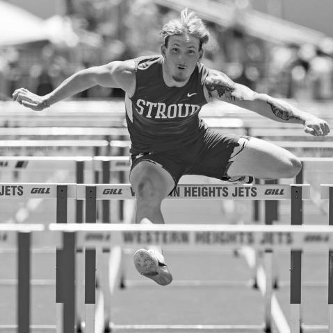 Jacob Beck competes in the 110-meter hurdles, which he won. Photo/Beth Young