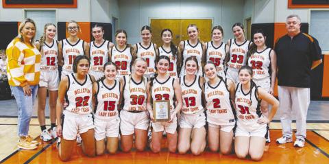 Some schools have been in the gym for a while, but all area schools have gotten into action after Tuesday night. The unbeaten Wellston Lady Tigers (above), ranked No. 16 in ClassA, won the Agra Invitational and pushed their record to 9-0. The Meeker boys won their half of the tournament, beating Carney in the finals. 75-44. For more area basketball, please see Section C. Photo/Jeremy Self