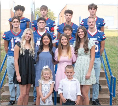 The candidates and escorts for Chandler’s homecoming court pose in front of the Media Center on Monday. They are, Back Row: Javarious Wade, Maddox Metheny, Bryson Taylor, Coniah Ritchie; Middle Row: Clayton Ritchie, Sam Hall, Tallan Boggs, Brody Waldman; Front Row: Blaklei Smith, Kennedy Allen, Jaycee Cross, Elli Hilgenfeld; Kids: Kimber Byus and Cruz Wunderlich. The coronation will be 6 p.m. Friday before the football game against Clinton. Photo/Emily Kalka